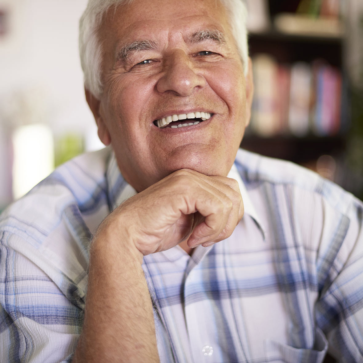portrait-cheerful-grandfather-sitting-room